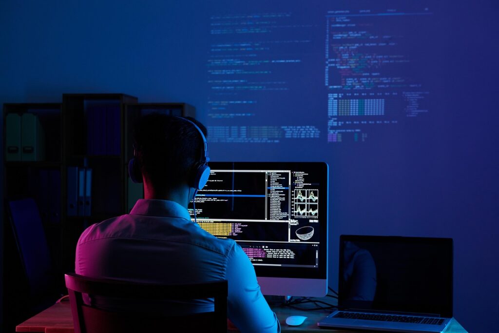 développeur IT qui supervise du code généré par intelligence artificielle en 2026